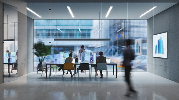 Group of people working in a modern board room with augmented reality interface